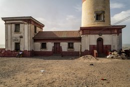 Lighthouse,-Keepers-house,-Renovation,-Construction-site,-British-colonial-architecture,-Victorian-era,-Maritime-heritage,-Red-socle,-White-facade,-Architectural-detail,-Jamestown,-Accra,-Ghana,-West-Africa